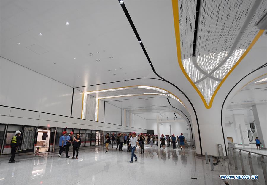 Photo taken on June 15, 2019 shows a station of a new airport subway line at Beijing Daxing International Airport in Beijing, capital of China. Self-driving trains for the subway line connecting downtown Beijing with its new international airport started trial run Saturday, according to local authorities. Stretching 41.4 kilometers, the new line supports autopilot system and can run at a speed of 160 km per hour, with as many as 448 passengers, according to Beijing Major Projects Construction Headquarters Office. (Xinhua/Zhang Chenlin)