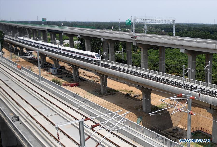 A train runs on a new airport subway line for trial in Beijing, capital of China, June 15, 2019. Self-driving trains for the subway line connecting downtown Beijing with its new international airport started trial run Saturday, according to local authorities. Stretching 41.4 kilometers, the new line supports autopilot system and can run at a speed of 160 km per hour, with as many as 448 passengers, according to Beijing Major Projects Construction Headquarters Office. (Xinhua/Zhang Chenlin)