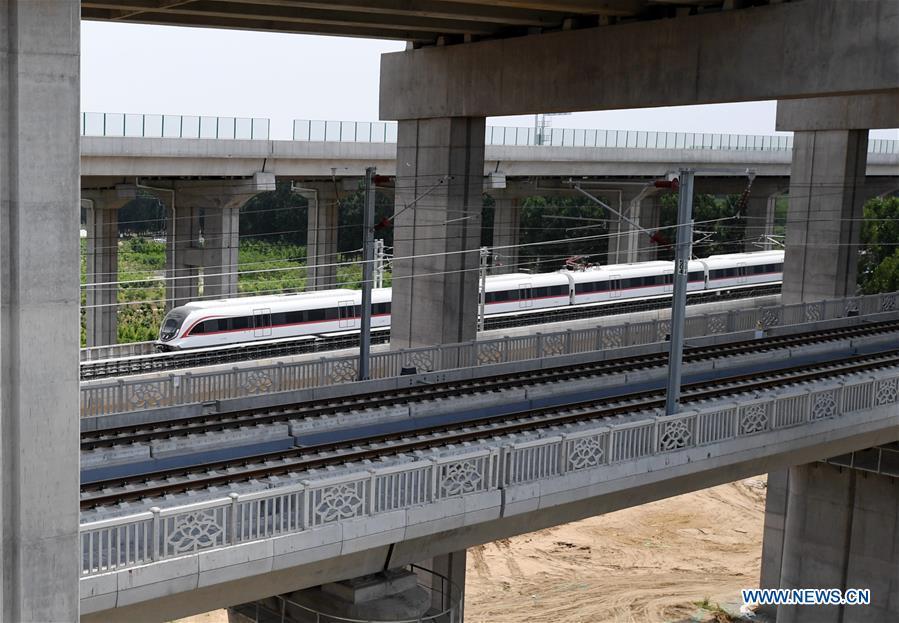 A train runs on a new airport subway line for trial in Beijing, capital of China, June 15, 2019. Self-driving trains for the subway line connecting downtown Beijing with its new international airport started trial run Saturday, according to local authorities. Stretching 41.4 kilometers, the new line supports autopilot system and can run at a speed of 160 km per hour, with as many as 448 passengers, according to Beijing Major Projects Construction Headquarters Office. (Xinhua/Zhang Chenlin)