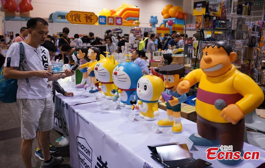 People visit the 2019 Hong Kong Toy Festival held at the Hong Kong Convention and Exhibition Centre, June 16, 2019. Among the festival’s highlights are displays of toys from the past, a nostalgic reminder for adults of their childhood memories.  (Photo: China News Service/Zhang Wei)