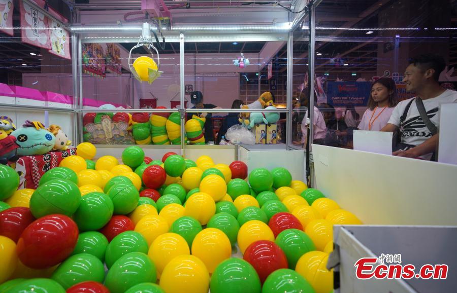 People visit the 2019 Hong Kong Toy Festival held at the Hong Kong Convention and Exhibition Centre, June 16, 2019. Among the festival’s highlights are displays of toys from the past, a nostalgic reminder for adults of their childhood memories.  (Photo: China News Service/Zhang Wei)