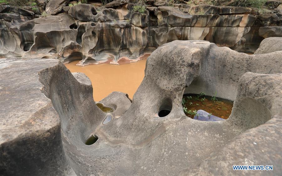 Photo taken on June 16, 2019 shows a pothole landscape along the Shenyu River valley in Huoshi Village of Tieliu Township, Huidong County, southwest China\'s Sichuan Province. (Xinhua/Jiang Hongjing)