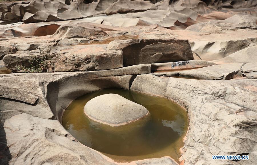 Photo taken on June 16, 2019 shows a pothole landscape along the Shenyu River valley in Huoshi Village of Tieliu Township, Huidong County, southwest China\'s Sichuan Province. (Xinhua/Jiang Hongjing)