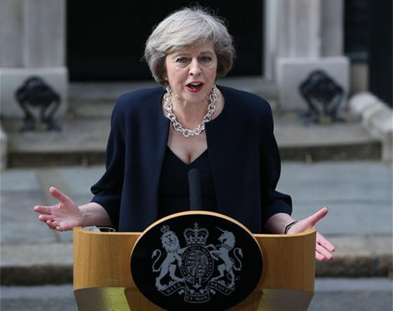 Britain's new Prime Minister Theresa May delivers a speech after arriving at 10 Downing Street in London, Britain on July 13, 2016. Britain's new Prime Minister Theresa May arrived at Downing Street on Wednesday after gaining consent from Queen Elizabeth II. (Xinhua/Han Yan) Britain's new Prime Minister Theresa May delivers a speech after arriving at 10 Downing Street in London, Britain on July 13, 2016. Britain's new Prime Minister Theresa May arrived at Downing Street on Wednesday after gaining consent from Queen Elizabeth II. (Xinhua/Han Yan)