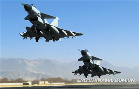 The picture shows that two J-10 fighters of a regiment under the Air Force of the Chinese Peoples Liberation Army (PLA) stationed in Tibet are conducting confrontation training. (Photo by Liu Yinghua)