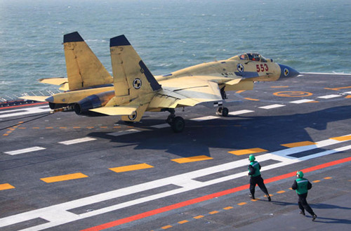 A carrier-borne J-15 fighter jet lands on China's first aircraft carrier, the Liaoning. [Undated photo/Xinhua]