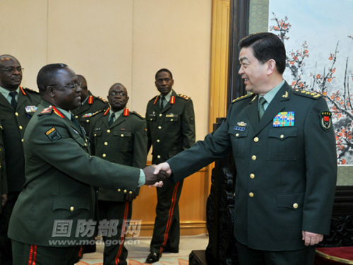 Chang Wanquan, state councilor and minister of national defense of the Peoples Republic of China (PRC), meets with Lt. Gen. Paul Mihova, the visiting Zambian army commander, on the afternoon of May 22 in Beijing. (Photo by Li Xiaowei)