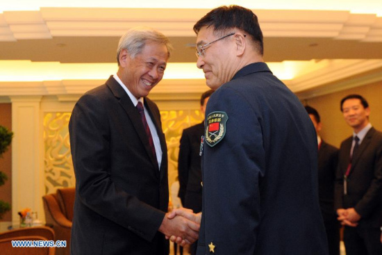 Admiral Sun Jianguo (R), vice chief of staff of China's People's Liberation Army (PLA), meets with Ng Eng Hen, Singapore's Defense Minister, on the sidelines of the 14th Shangri-La Dialogue in Singapore, on May 29, 2015. (Xinhua/Then Chih Wey) Admiral Sun Jianguo (R), vice chief of staff of China's People's Liberation Army (PLA), meets with Ng Eng Hen, Singapore's Defense Minister, on the sidelines of the 14th Shangri-La Dialogue in Singapore, on May 29, 2015. (Xinhua/Then Chih Wey)