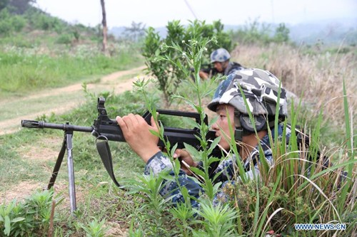 File photo shows soldiers of the Chinese Air Force special airborne operation troop attending a drill on May 25, 2015. A special airborne operation troop of the Chinese Air Force left for Belarus on June 15, 2015 to take part in the China-Belarus Dashing Eagle 2015 counter-terrorism exercise, to end on June 27. (Xinhua/Huang Hui) File photo shows soldiers of the Chinese Air Force special airborne operation troop attending a drill on May 25, 2015. A special airborne operation troop of the Chinese Air Force left for Belarus on June 15, 2015 to take part in the China-Belarus Dashing Eagle 2015 counter-terrorism exercise, to end on June 27. (Xinhua/Huang Hui)