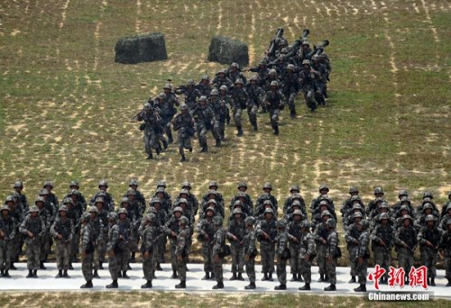 The People's Liberation Army (PLA) Hong Kong Garrison started a live-fire exercise in Hong Kong suburb on Saturday, July 4, 2015, the first of its kind since 1997 that local residents are invited to observe. (Photo/chinanews.com) The People's Liberation Army (PLA) Hong Kong Garrison started a live-fire exercise in Hong Kong suburb on Saturday, July 4, 2015, the first of its kind since 1997 that local residents are invited to observe. (Photo/chinanews.com)