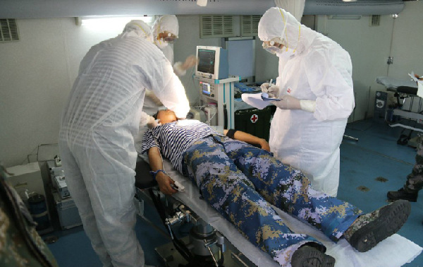 A nuclear emergency medical rescue drill codenamed Medical Service Force – 2015C is conducted at a training base of the PLA Academy of Military Medical Sciences (AMMS) in July 2015. A nuclear emergency medical rescue drill codenamed Medical Service Force – 2015C is conducted at a training base of the PLA Academy of Military Medical Sciences (AMMS) in July 2015.