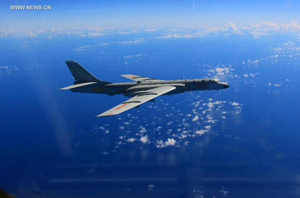 A bombardment aircraft participates a drill of China air force in the western Pacific, Aug. 14, 2015. The People's Liberation Army (PLA) Air Force conducted a drill involving multiple types of aircraft in the western Pacific on Friday. (Photo: Xinhua/Feng Xiang) A bombardment aircraft participates a drill of China air force in the western Pacific, Aug. 14, 2015. The People's Liberation Army (PLA) Air Force conducted a drill involving multiple types of aircraft in the western Pacific on Friday. (Photo: Xinhua/Feng Xiang)