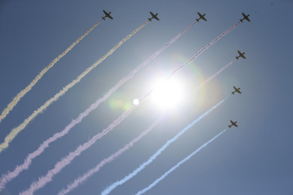 Trainer aircraft escorting the flags attend a parade in Beijing, capital of China, Sept. 3, 2015. China on Thursday held commemoration activities, including a grand military parade, to mark the 70th anniversary of the victory of the Chinese People's War of Resistance Against Japanese Aggression and the World Anti-Fascist War. (Photo: Xinhua/Ren Zhenglai) Trainer aircraft escorting the flags attend a parade in Beijing, capital of China, Sept. 3, 2015. China on Thursday held commemoration activities, including a grand military parade, to mark the 70th anniversary of the victory of the Chinese People's War of Resistance Against Japanese Aggression and the World Anti-Fascist War. (Photo: Xinhua/Ren Zhenglai)