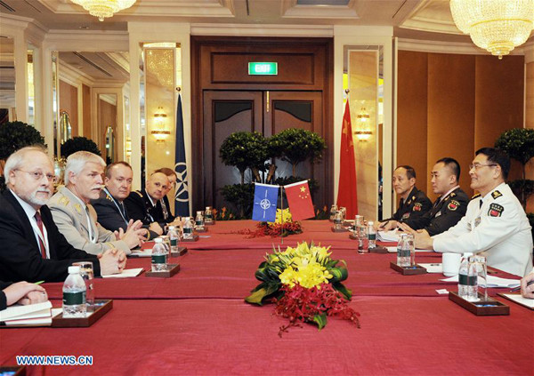 Admiral Sun Jianguo (1st R), deputy chief of the Joint Staff Department of China's Central Military Commission, meets with Chairman of the NATO Military Committee Petr Pavel (2nd L) in Singapore, on June 4, 2016. (Xinhua/Then Chih Wey) Admiral Sun Jianguo (1st R), deputy chief of the Joint Staff Department of China's Central Military Commission, meets with Chairman of the NATO Military Committee Petr Pavel (2nd L) in Singapore, on June 4, 2016. (Xinhua/Then Chih Wey)