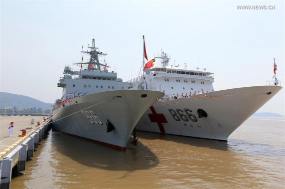 Chinese supply ship Gaoyou Lake (L) and hospital ship Peace Ark prepare to leave a military port in Zhoushan City, east China's Zhejiang Province, June 15, 2016, for Hawaii, the United States, to participate in the Rim of the Pacific - 2016 multinational exercises. (Photo/Xinhua) Chinese supply ship Gaoyou Lake (L) and hospital ship Peace Ark prepare to leave a military port in Zhoushan City, east China's Zhejiang Province, June 15, 2016, for Hawaii, the United States, to participate in the Rim of the Pacific - 2016 multinational exercises. (Photo/Xinhua)