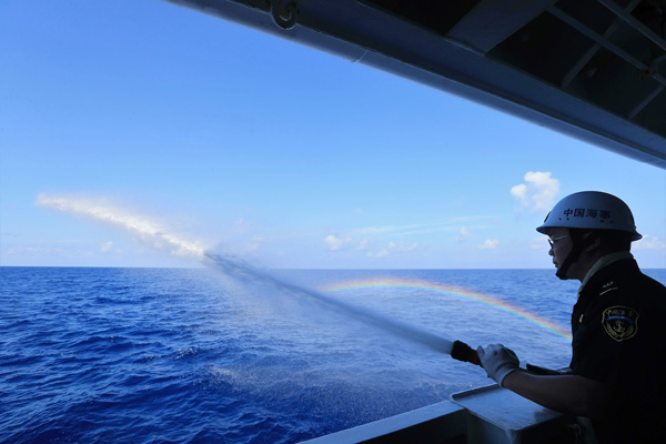 A crew member takes part in a fire drill on China's largest and most advanced patrol vessel Haixun 01 on the South China Sea, April 4, 2016. (Photo/Xinhua) A crew member takes part in a fire drill on China's largest and most advanced patrol vessel Haixun 01 on the South China Sea, April 4, 2016. (Photo/Xinhua)