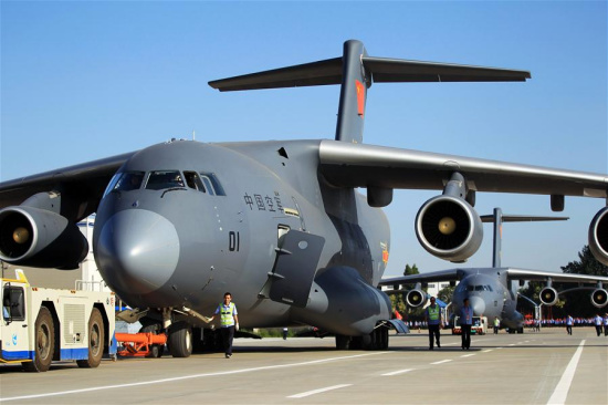 Photo taken in June, 2016 shows two Y-20 planes, China's homegrown large transport aircraft, taxiing to airport runway. Two Y-20 planes officially joined the People's Liberation Army Air Force on July 6, 2016. (Xinhua/Xing Guangli) 