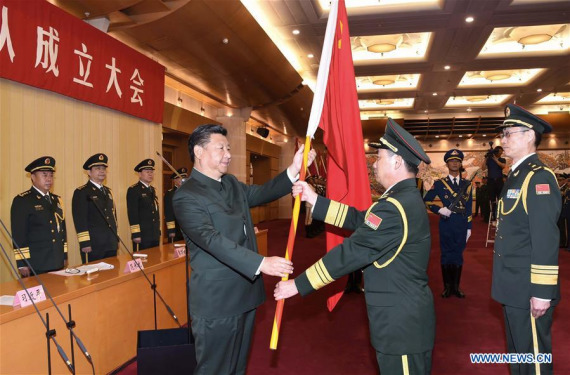 Chinese President Xi Jinping(L, front), also general secretary of the Communist Party of China (CPC) Central Committee and chairman of the Central Military Commission (CMC), confers a military flag to Commander Li Shisheng and Political Commissar Yin Zhihong of Wuhan Joint Logistics Unit as the CMC established a joint logistics support force in Beijing, capital of China, Sept. 13, 2016. (Photo: Xinhua/Li Gang) Chinese President Xi Jinping(L, front), also general secretary of the Communist Party of China (CPC) Central Committee and chairman of the Central Military Commission (CMC), confers a military flag to Commander Li Shisheng and Political Commissar Yin Zhihong of Wuhan Joint Logistics Unit as the CMC established a joint logistics support force in Beijing, capital of China, Sept. 13, 2016. (Photo: Xinhua/Li Gang)