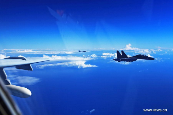 A Su-30 fighter and an H-6K bomber of the Chinese Air Force take part in a drill, Sept. 25, 2016. (Photo: Xinhua/Tian Ning) A Su-30 fighter and an H-6K bomber of the Chinese Air Force take part in a drill, Sept. 25, 2016. (Photo: Xinhua/Tian Ning)