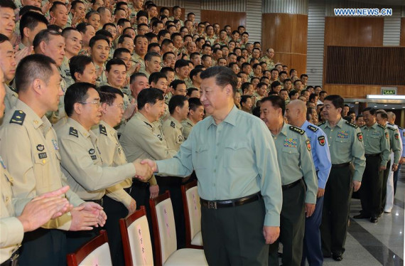 Chinese President Xi Jinping, also general secretary of the Communist Party of China (CPC) Central Committee and chairman of the Central Military Commission (CMC), shakes hands with delegates attending the first People's Liberation Army (PLA) Rocket Force Party congress during his inspection of the PLA Rocket Force, in Beijing, Sept. 26, 2016. (Photo: Xinhua/Li Gang)
