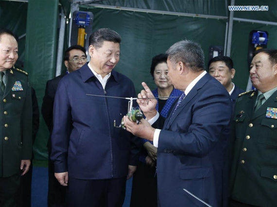 Chinese President Xi Jinping visits an exhibition on the high-technology achievements resulting from military and civilian cooperation in Beijing, capital of China, Oct. 19, 2016. (Photo: Xinhua/Ju Peng) Chinese President Xi Jinping visits an exhibition on the high-technology achievements resulting from military and civilian cooperation in Beijing, capital of China, Oct. 19, 2016. (Photo: Xinhua/Ju Peng)