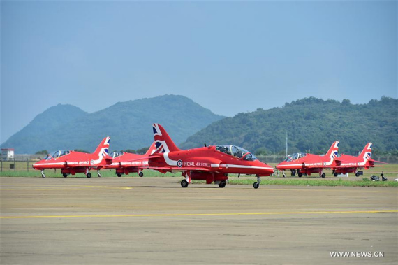 Jets of the Red Arrow, officially known as the Royal Air Force Aerobatic Team, arrive at the airport in Zhuhai, south China's Guangdong Province, Oct. 22, 2016. The British aerobatic team will perform at the 11th China International Aviation & Aerospace Exhibition, which will be held from Nov. 1 to 6 in Zhuhai. (Photo: Xinhua/Liang Xu) Jets of the Red Arrow, officially known as the Royal Air Force Aerobatic Team, arrive at the airport in Zhuhai, south China's Guangdong Province, Oct. 22, 2016. The British aerobatic team will perform at the 11th China International Aviation & Aerospace Exhibition, which will be held from Nov. 1 to 6 in Zhuhai. (Photo: Xinhua/Liang Xu)