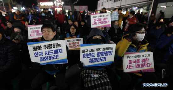 Protesters hold slogans during a rally to oppose the plan to deploy Terminal High Altitude Area Defense (THAAD) in Jimchon-shi, South Korea, March 8, 2017. (Xinhua/Yao Qilin) Protesters hold slogans during a rally to oppose the plan to deploy Terminal High Altitude Area Defense (THAAD) in Jimchon-shi, South Korea, March 8, 2017. (Xinhua/Yao Qilin)