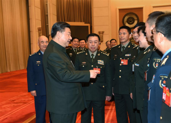 Chinese President Xi Jinping, also general secretary of the Communist Party of China Central Committee and chairman of the Central Military Commission, meets with deputies from grassroots units to the 12th National People's Congress (NPC) after a panel discussion in Beijing, capital of China, March 12, 2017. (Xinhua/Li Gang) Chinese President Xi Jinping, also general secretary of the Communist Party of China Central Committee and chairman of the Central Military Commission, meets with deputies from grassroots units to the 12th National People's Congress (NPC) after a panel discussion in Beijing, capital of China, March 12, 2017. (Xinhua/Li Gang)