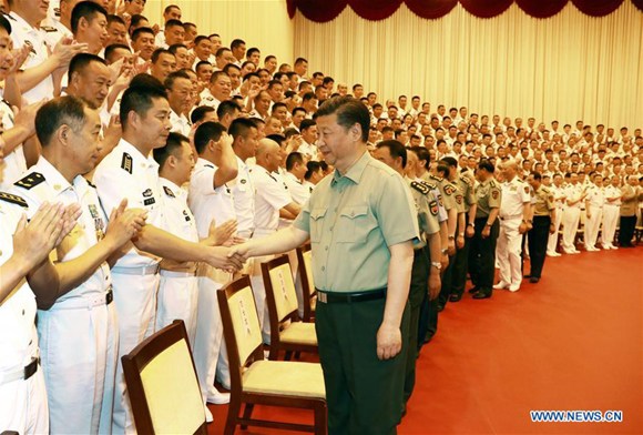 Chinese President Xi Jinping (R, front), who is also general secretary of the Communist Party of China (CPC) Central Committee and chairman of the Central Military Commission, shakes hands with delegates to the 12th Party congress of the People's Liberation Army (PLA) Navy, during an inspection of the PLA Navy headquarters, in Beijing, capital of China, May 24, 2017. (Xinhua/Zha Chunming) Chinese President Xi Jinping (R, front), who is also general secretary of the Communist Party of China (CPC) Central Committee and chairman of the Central Military Commission, shakes hands with delegates to the 12th Party congress of the People's Liberation Army (PLA) Navy, during an inspection of the PLA Navy headquarters, in Beijing, capital of China, May 24, 2017. (Xinhua/Zha Chunming)