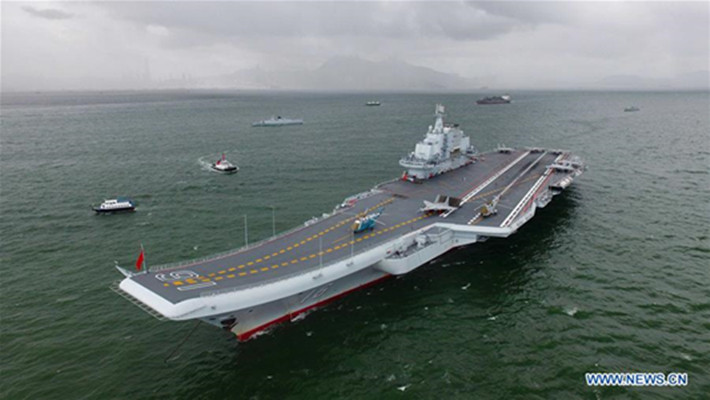 Chinese aircraft carrier Liaoning is berthed at the Victoria bay in Hong Kong Special Administrative Region (HKSAR), south China, July 7, 2017. A flotilla including China's first aircraft carrier Liaoning on Friday arrived in HKSAR for a visit, during which Liaoning will, for the first time, be open for the public to visit. According to the Navy's plan, sailors of the flotilla will attend local activities to celebrate the 20th anniversary of the People's Liberation Army being stationed in the HKSAR. (Xinhua/Zeng Tao) Chinese aircraft carrier Liaoning is berthed at the Victoria bay in Hong Kong Special Administrative Region (HKSAR), south China, July 7, 2017. A flotilla including China's first aircraft carrier Liaoning on Friday arrived in HKSAR for a visit, during which Liaoning will, for the first time, be open for the public to visit. According to the Navy's plan, sailors of the flotilla will attend local activities to celebrate the 20th anniversary of the People's Liberation Army being stationed in the HKSAR. (Xinhua/Zeng Tao)