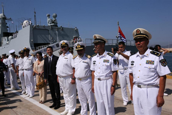 A welcome ceremony is held for the visiting Chinese naval fleet at Piraeus port, Greece, July 23, 2017. A Chinese naval fleet arrived on Sunday at Piraeus port for a four-day friendly visit to Greece, conveying a message of friendship and cooperation.(Xinhua/Marios Lolos) A welcome ceremony is held for the visiting Chinese naval fleet at Piraeus port, Greece, July 23, 2017. A Chinese naval fleet arrived on Sunday at Piraeus port for a four-day friendly visit to Greece, conveying a message of friendship and cooperation.(Xinhua/Marios Lolos)