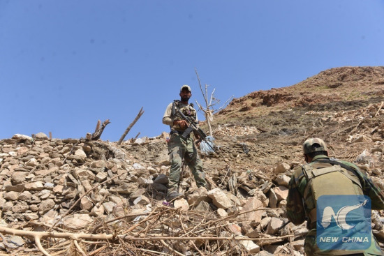 File photo: Afghan army soldiers inspect at the site of a U.S. bombing in Achin district of Nangarhar province, Afghanistan, April 28, 2017. (Xinhua/Rahman Safi) File photo: Afghan army soldiers inspect at the site of a U.S. bombing in Achin district of Nangarhar province, Afghanistan, April 28, 2017. (Xinhua/Rahman Safi)
