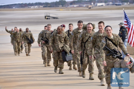 File Photo: Paratroopers from the XVIII Airborne Corps headquarters returned from Afghanistan arrive at Green Ramp at Fort Bragg, North Carolina, the United States, Dec. 5, 2014. (Xinhua/Yin Bogu) File Photo: Paratroopers from the XVIII Airborne Corps headquarters returned from Afghanistan arrive at Green Ramp at Fort Bragg, North Carolina, the United States, Dec. 5, 2014. (Xinhua/Yin Bogu)