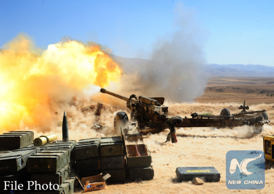 A Hezbollah fighter fires at a position of the Islamic State (IS) group in Syria's Qalamoun region, on Aug. 26, 2017. (Xinhua/Ammar Safarjalani) A Hezbollah fighter fires at a position of the Islamic State (IS) group in Syria's Qalamoun region, on Aug. 26, 2017. (Xinhua/Ammar Safarjalani)