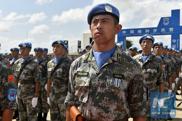 Chinese peacekeeping soldiers wait for the glorious moment at the medal-receiving ceremony on Oct. 3, 2017. (Xinhua/Li Zan) Chinese peacekeeping soldiers wait for the glorious moment at the medal-receiving ceremony on Oct. 3, 2017. (Xinhua/Li Zan)