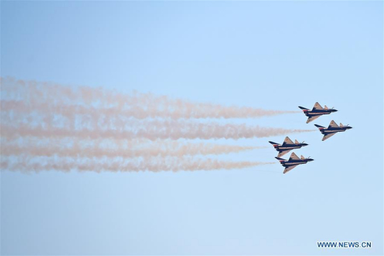 J-10 aerobatic fighter jets of the Chinese Air Force's August 1st Air Demonstration Team perform on the opening day of the Dubai Airshow 2017 in Dubai, the United Arab Emirates, on Nov. 12, 2017.  (Xinhua/Zhao Dingzhe)