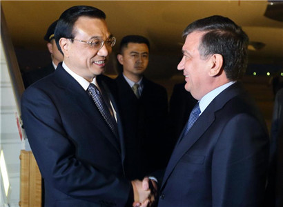 Premier Li Keqiang arrives in Uzbekistan for SCO meeting 