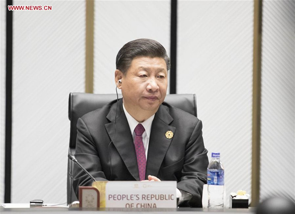 Xi