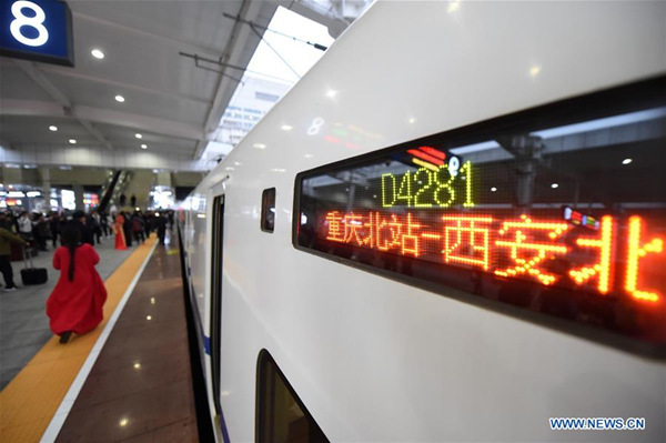 A bullet train prepares to leave for Xi'an, capital of northwest China's Shaanxi Province, at the Chongqingbei Railway Station in southwest China's Chongqing Municipality, Dec. 6, 2017. (Xinhua/Tang Yi) A bullet train prepares to leave for Xi'an, capital of northwest China's Shaanxi Province, at the Chongqingbei Railway Station in southwest China's Chongqing Municipality, Dec. 6, 2017. (Xinhua/Tang Yi)