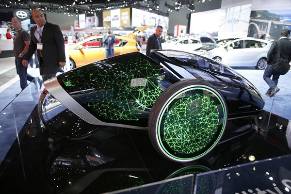 Visitors view a Toyota Future Mobility Concept car at the 2014 Los Angeles Auto Show in Los Angeles, California, November 20, 2014. (Photo/China News Service) Visitors view a Toyota Future Mobility Concept car at the 2014 Los Angeles Auto Show in Los Angeles, California, November 20, 2014. (Photo/China News Service)