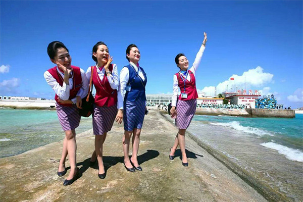 Chinese stewardesses celebrate. (Photo/Xinhua) Chinese stewardesses celebrate. (Photo/Xinhua)