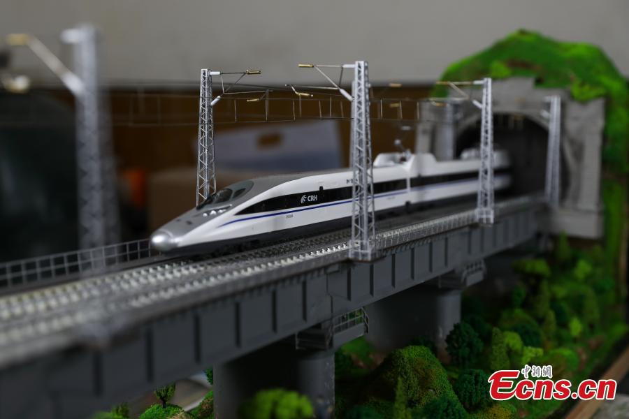 Train attendant makes replica to mark new high-speed railway