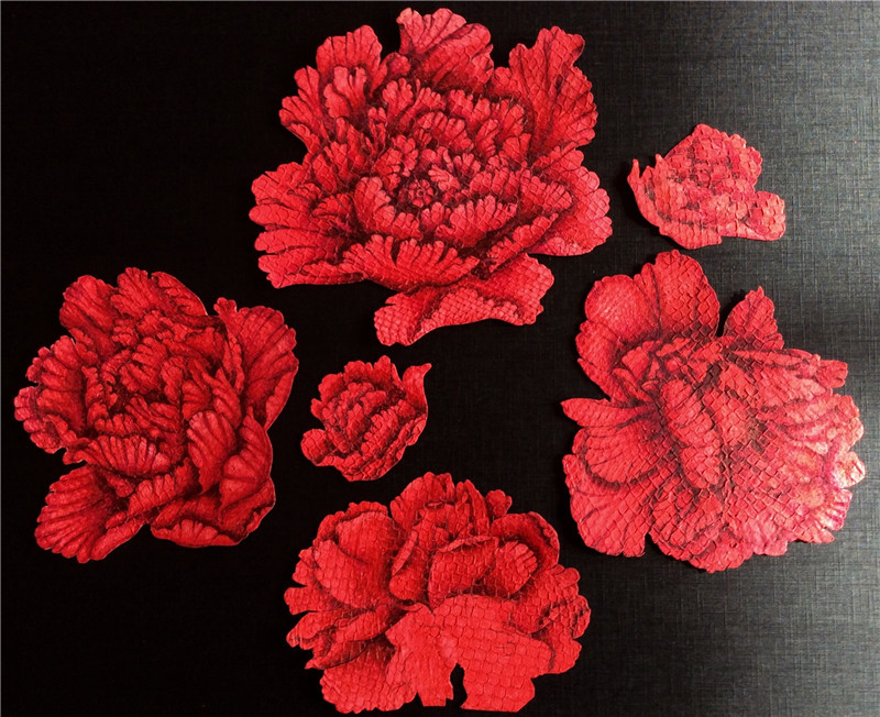 Artist continues fish skin painting tradition in Harbin