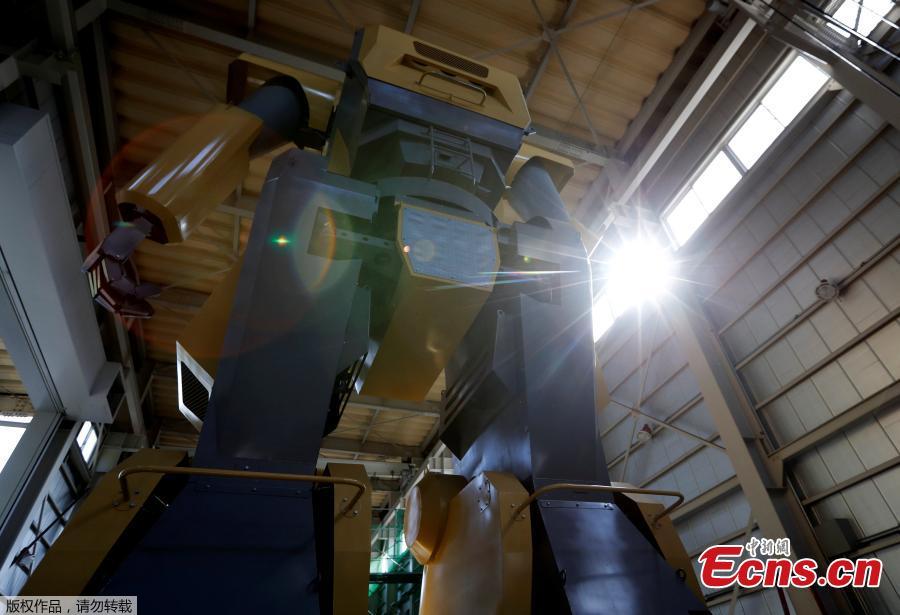Japanese engineer builds giant robot to realize 'Gundam' dream