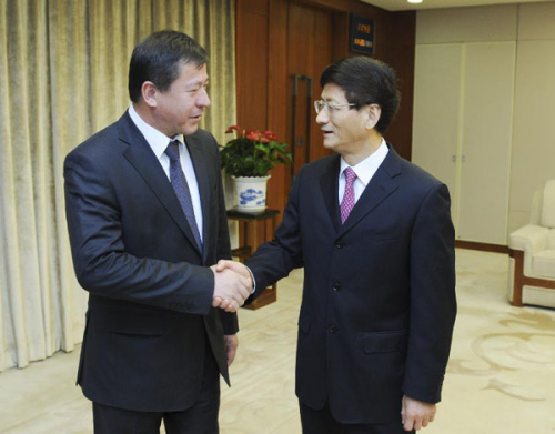 Chinese State Councilor Meng Jianzhu (R), also a member of the Political Bureau of the Communist Party of China (CPC) Central Committee, secretary of the Commission for Political and Legal Affairs of the CPC Central Committee and China's public security minister, meets with Tajikistan's Interior Minister Ramazon Rahimov in Beijing, capital of China, Nov. 26, 2012. (Xinhua/Zhang Duo)