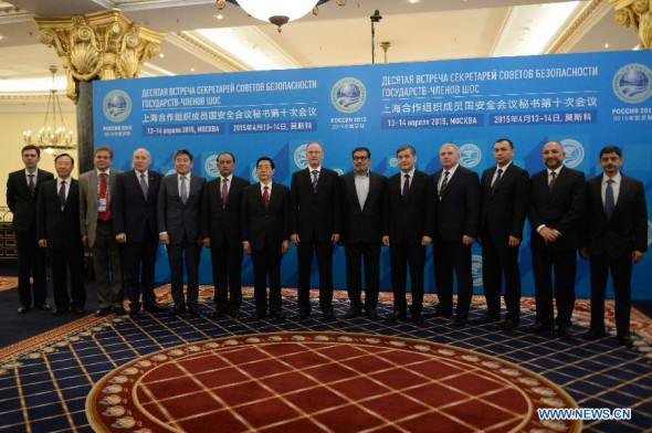 Chinese State Councilor Guo Shengkun (7th L) and other representatives pose for group photos during the 10th meeting of the Shanghai Cooperation Organization (SCO) security council secretaries in Moscow, Russia, April 14, 2015. China is willing to coordinate with all parties and strengthen the cooperation on law enforcement security under the framework of SCO, visiting Chinese State Councilor Guo Shengkun said Tuesday. (Photo/Xinhua) Chinese State Councilor Guo Shengkun (7th L) and other representatives pose for group photos during the 10th meeting of the Shanghai Cooperation Organization (SCO) security council secretaries in Moscow, Russia, April 14, 2015. China is willing to coordinate with all parties and strengthen the cooperation on law enforcement security under the framework of SCO, visiting Chinese State Councilor Guo Shengkun said Tuesday. (Photo/Xinhua)