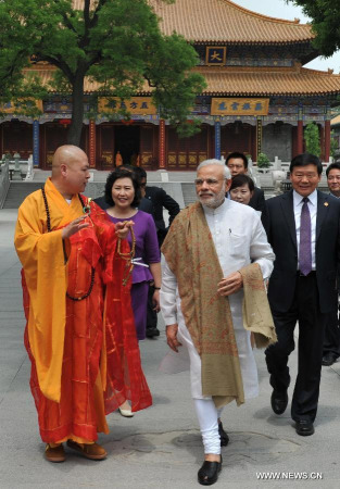 Indian Prime Minister Narendra Modi visits the Daxingshan Temple in Xi'an, capital of northwest China's Shaanxi Province, May 14, 2015. Modi arrived in Xi'an Thursday for an official visit to China. (Xinhua/Ding Haitao) Indian Prime Minister Narendra Modi visits the Daxingshan Temple in Xi'an, capital of northwest China's Shaanxi Province, May 14, 2015. Modi arrived in Xi'an Thursday for an official visit to China. (Xinhua/Ding Haitao)