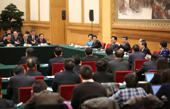 Chinese President Xi Jinping (back, 4th R) joins a panel discussion with deputies to the 12th National People's Congress (NPC) from northeast China's Jilin province during the third session of the 12th NPC, in Beijing, capital of China, March 9, 2015. (Photo/Xinhua) Chinese President Xi Jinping (back, 4th R) joins a panel discussion with deputies to the 12th National People's Congress (NPC) from northeast China's Jilin province during the third session of the 12th NPC, in Beijing, capital of China, March 9, 2015. (Photo/Xinhua)