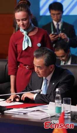 China's Foreign Minister Wang Yi at an agreements signing ceremony at a meeting of the Council of Foreign Ministers of the Shanghai Cooperation Organisation (SCO) member states, Moscow, Russia. June 3, 2015. (CNS photo/ Wang Xiujun) China's Foreign Minister Wang Yi at an agreements signing ceremony at a meeting of the Council of Foreign Ministers of the Shanghai Cooperation Organisation (SCO) member states, Moscow, Russia. June 3, 2015. (CNS photo/ Wang Xiujun)