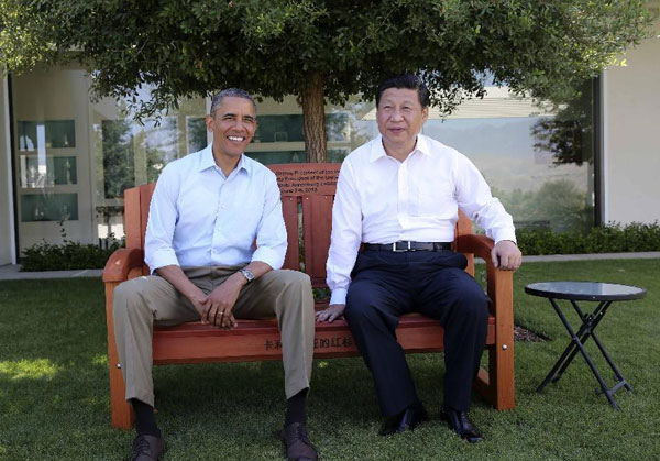 U.S. President Barack Obama and Chinese President Xi Jinping rest during a tour at the Annenberg Retreat, California, June 8, 2013. (Photo/Xinhua) U.S. President Barack Obama and Chinese President Xi Jinping rest during a tour at the Annenberg Retreat, California, June 8, 2013. (Photo/Xinhua)